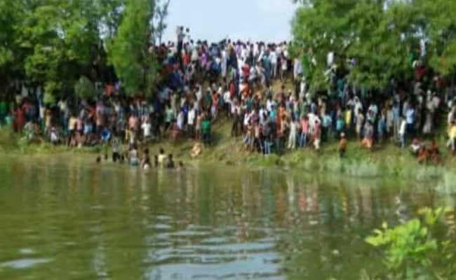तालाब से महिला का हाथ-पैर बंधा शव बरामद, पति गिरफ्तार