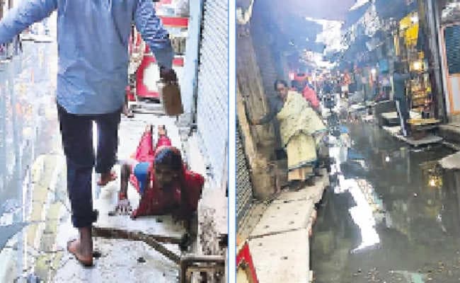 देवघर : शिवगंगा लेन में भरा नाले का पानी, भक्तों को हुई भारी परेशानी