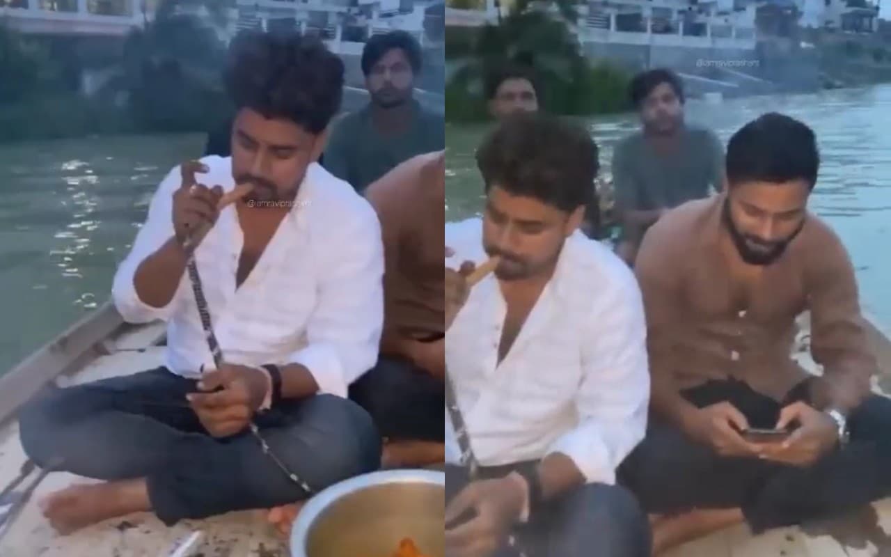 Viral Video: गंगा नदी में चलती नाव पर मांस पकाने और हुक्का पीने का वीडियो वायरल, जांच में जुटी UP पुलिस Viral Video: गंगा नदी में चलती नाव पर मांस पकाने और हुक्का पीने का वीडियो वायरल, जांच में जुटी UP पुलिस