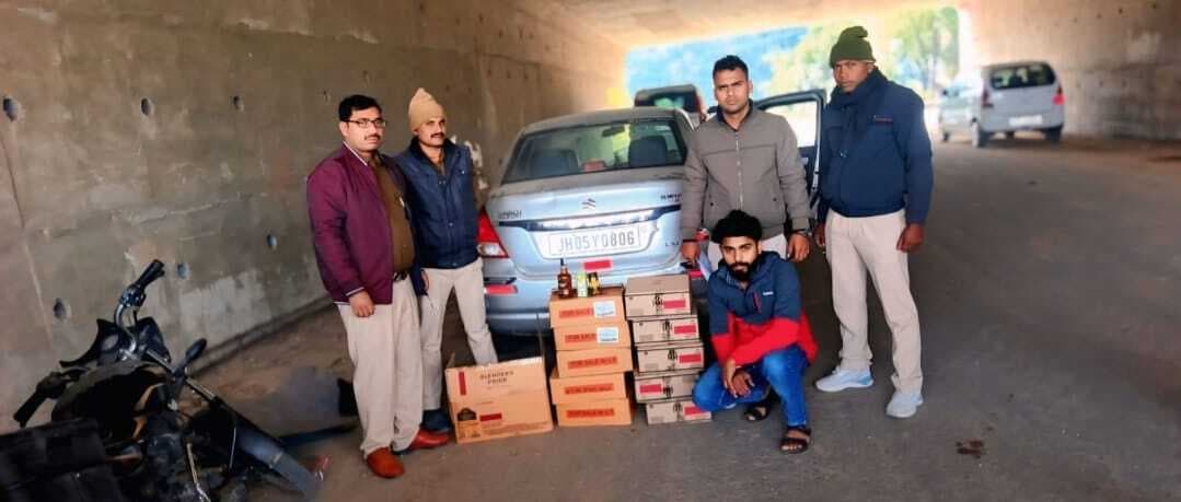 लग्जरी कार से भारी मात्रा में शराब जब्त, चालक गिरफ्तार