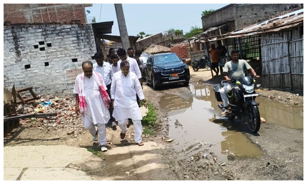 MLA Sanjay Kumar Pandey inspecting the damaged road in Roari village and interacting with local residents. MLA Sanjay Kumar Pandey inspecting the damaged road in Roari village and interacting with local residents.