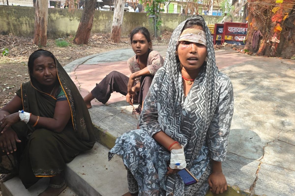 Injured woman and police team in Kaimur assault case Injured woman and police team in Kaimur assault case