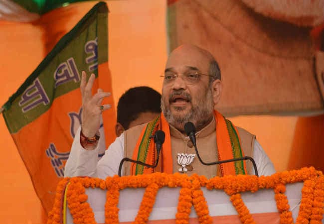 सोनिया के साथ बैठने से नीतीश का चश्मा भी इटालियन हो गया है : अमित शाह