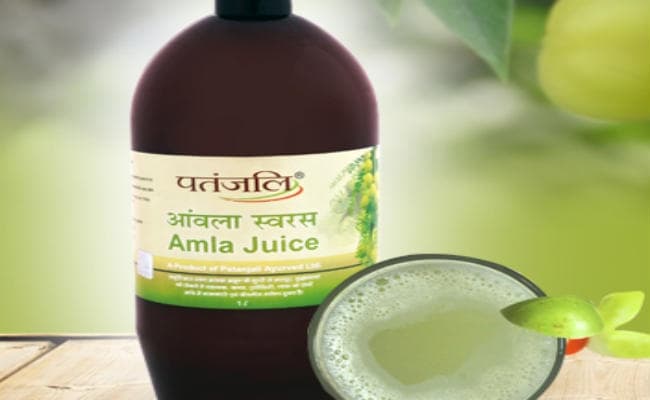 बाबा रामदेव को झटका, सेहत के लिए ठीक नहीं हैं पतंजलि के आंवला जूस, आर्मी कैंटीन में बिक्री पर लगी रोक