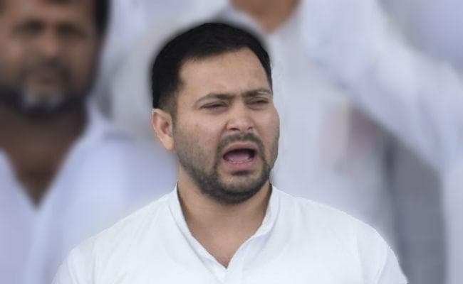 पोस्टर में सीएम नीतीश को दिखाया गया रावण, तो बोले तेजस्वी-मैं ऐसी तस्वीरों का समर्थन नहीं करता