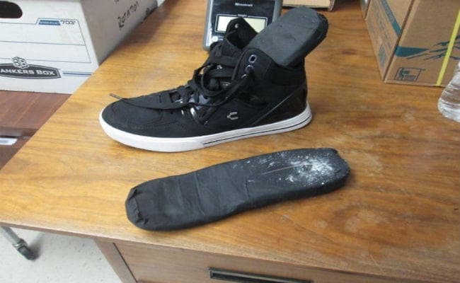 जूते के डिब्बे में हेरोइन की तस्करी, महिला गिरफ्तार