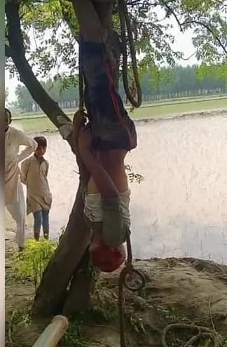 चोरी के शक में खेतिहर मजदूर को दीं बर्बर यातनाएं, पेड़ से उल्टा लटकाकर पीटा, पानी में भी डुबोया