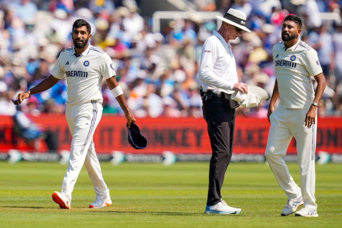 IND vs ENG: Jasprit Bumrah, Mohammed Siraj and Umpire Paul Reiffel IND vs ENG: Jasprit Bumrah, Mohammed Siraj and Umpire Paul Reiffel