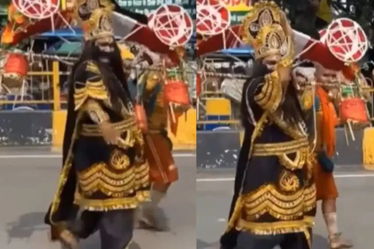 WATCH: सावन में भोले बाबा को प्रसन्न करने सड़क पर कांवड़ ले जाते दिखे लंकेश रावण, देखें Viral Video