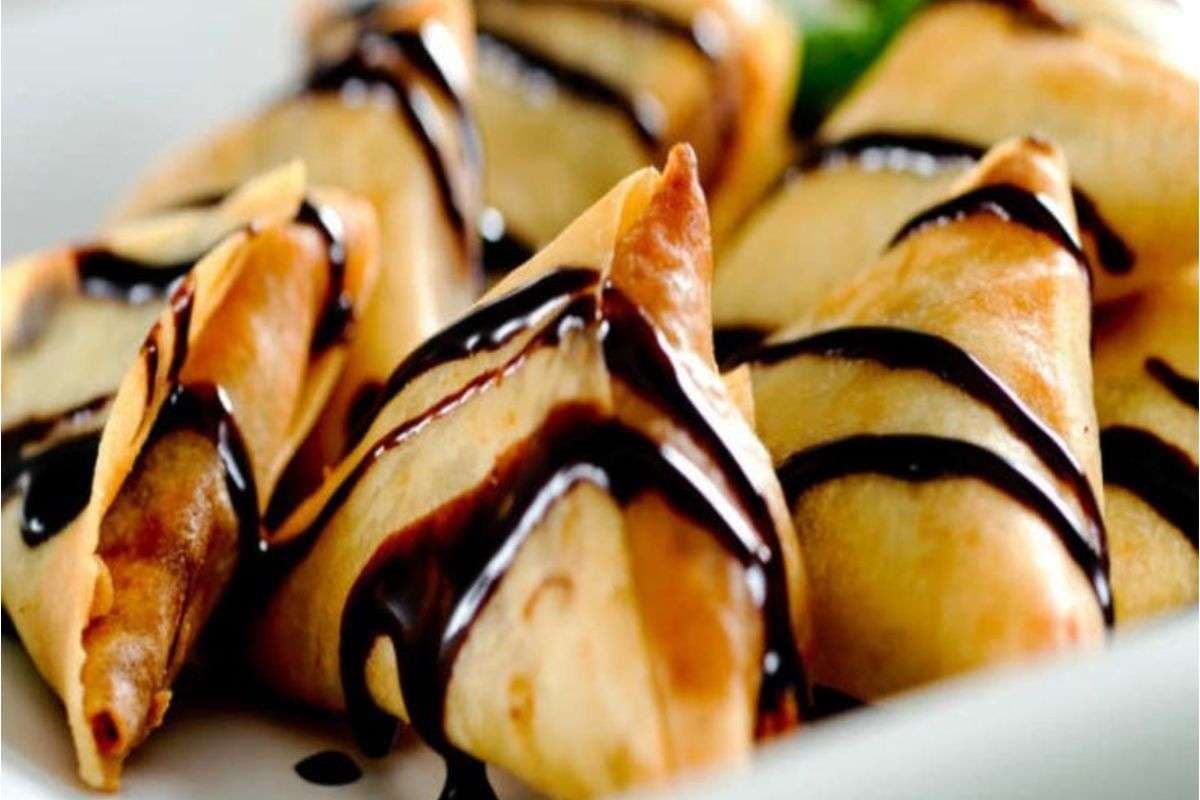 Chocolate Samosa Recipe: चाय के साथ ट्राय करें ये क्रिस्पी डेजर्ट समोसा,जिसे बच्चे और बड़े दोनों करेंगे पसंद Chocolate Samosa Recipe: चाय के साथ ट्राय करें ये क्रिस्पी डेजर्ट समोसा,जिसे बच्चे और बड़े दोनों करेंगे पसंद
