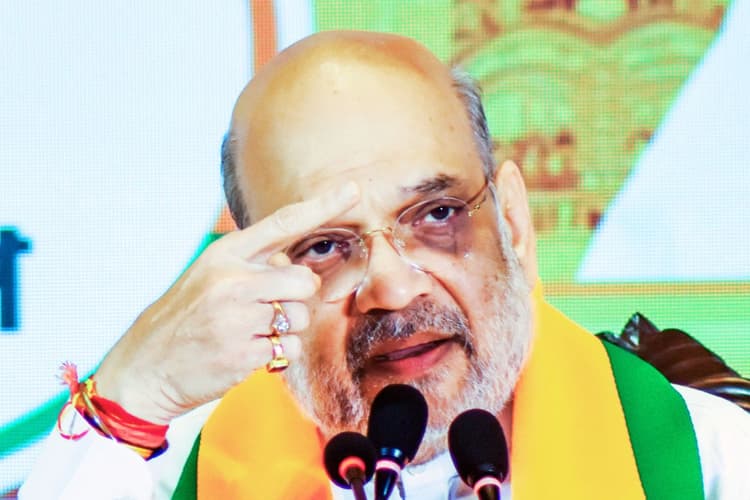 भारत कोई धर्मशाला नहीं है…, बांकुड़ा में गरजे अमित शाह, बोले- जड़ से मिटा देंगे TMC का सिंडिकेट राज