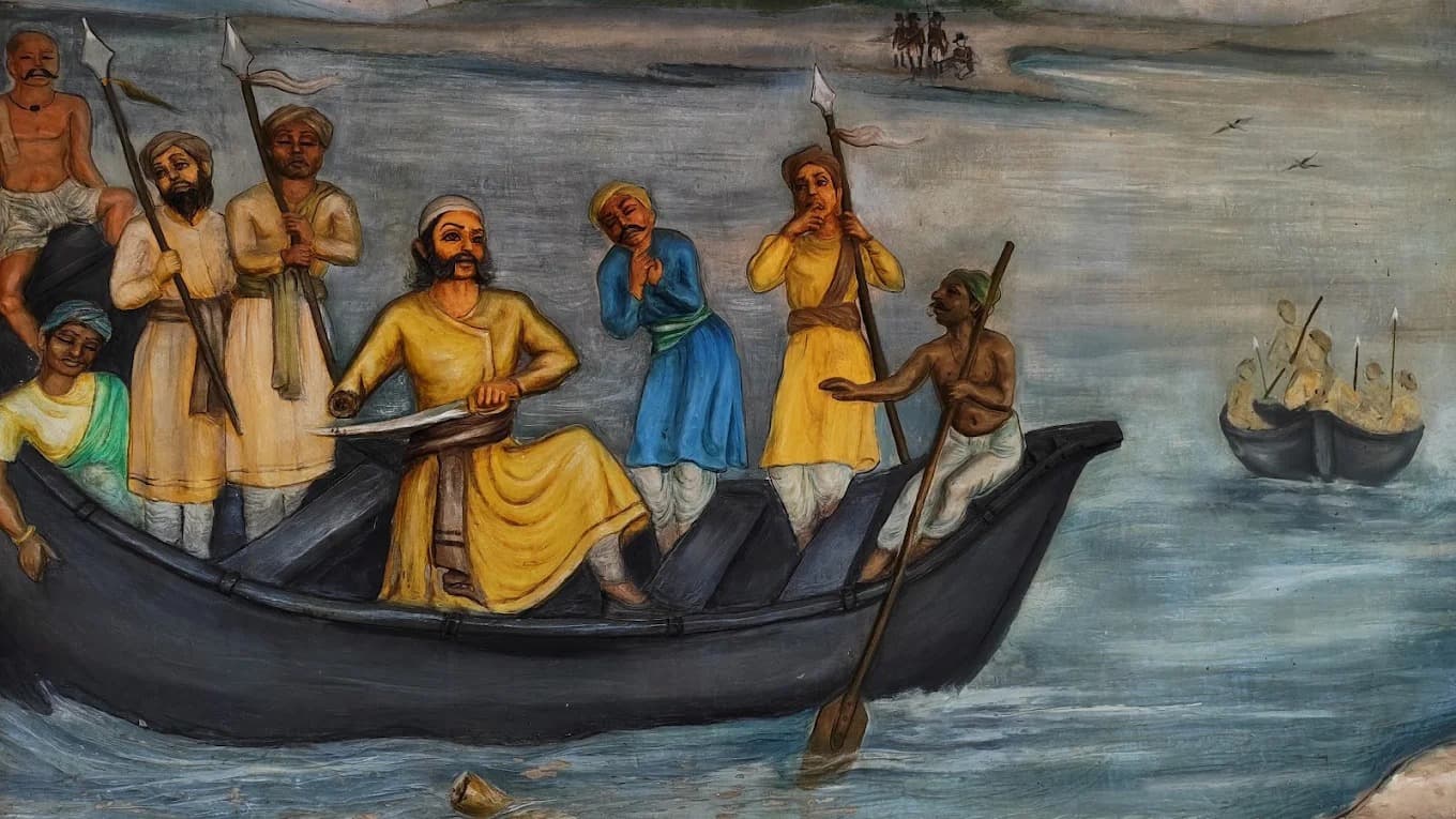जगदीशपुर किले के स्मृति संग्रहालय में प्रदर्शित यह ऐतिहासिक तैलचित्र (Oil Painting) 1857 के प्रथम स्वतंत्रता संग्राम के उस रोंगटे खड़े कर देने वाले क्षण को जीवंत करता है, जब अदम्य साहस के प्रतीक बाबू वीर कुंवर सिंह ने अपनी घायल कलाई को खुद अपनी तलवार से काटकर गंगा मैया को समर्पित कर दिया था. कैनवास पर उकेरे गए इस दृश्य में शिवपुर घाट पर गंगा नदी पार करते समय ब्रिटिश सेना की जहरीली गोली का शिकार होने के बाद, नाव के बीचोबीच बैठे 80 वर्षीय महानायक को बेहद दृढ़ और निर्भीक मुद्रा में अपना हाथ काटते हुए दिखाया गया है. पेंटिंग में नाव पर सवार उनके वफादार सैनिकों और नाविकों के चेहरों पर उपजे अचरज व भारी दुख के भाव उस ऐतिहासिक बलिदान की गंभीरता को बखूबी बयां करते हैं, जो आज भी यहाँ आने वाले हर सैलानी के भीतर राष्ट्रप्रेम और शौर्य की एक नई अलख जगा देता है.